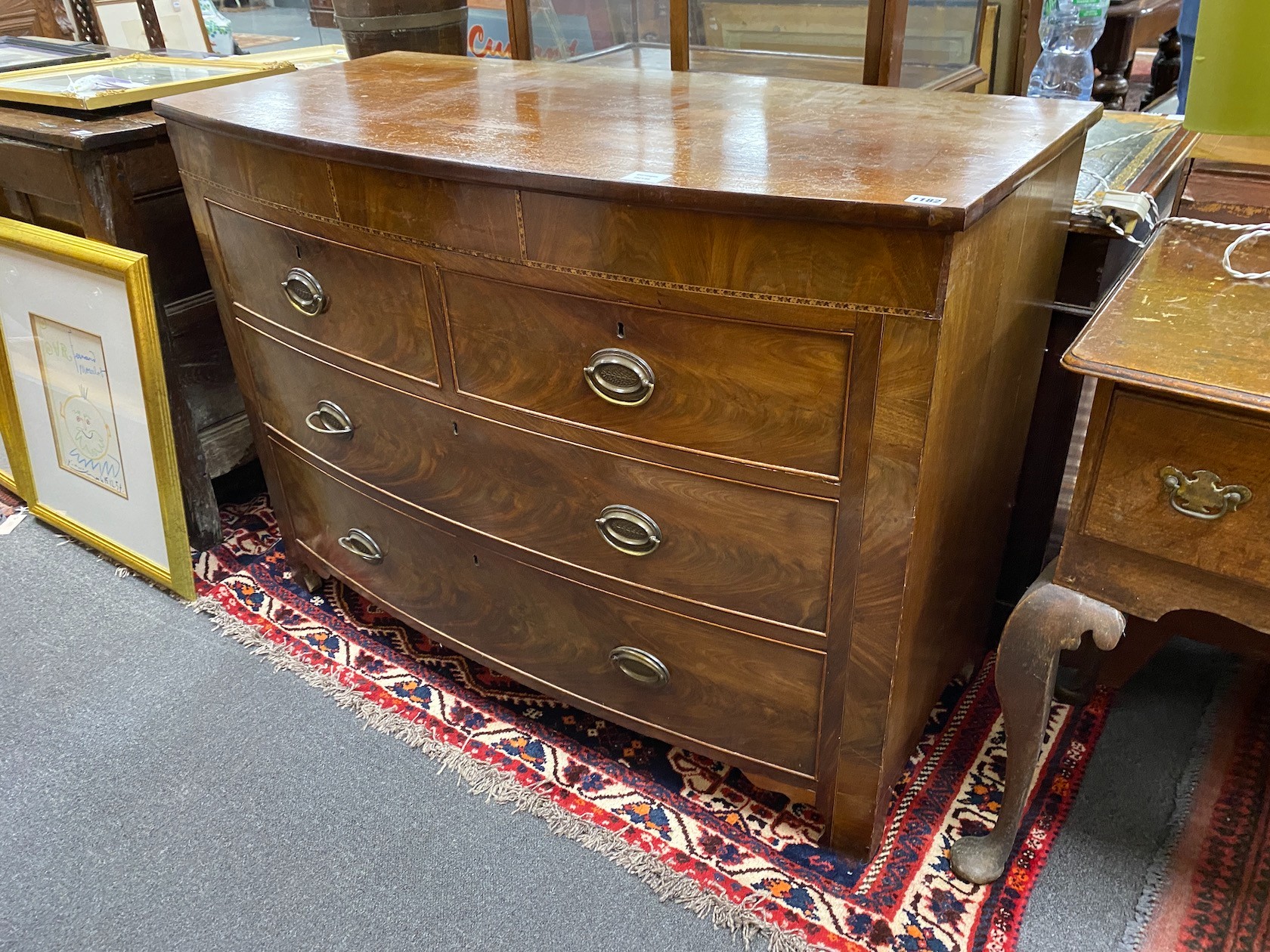 A George IV mahogany bow front chest, of two short and two long drawers incorporating a secret drawer, width 119cm, depth 55cm, height 87cm